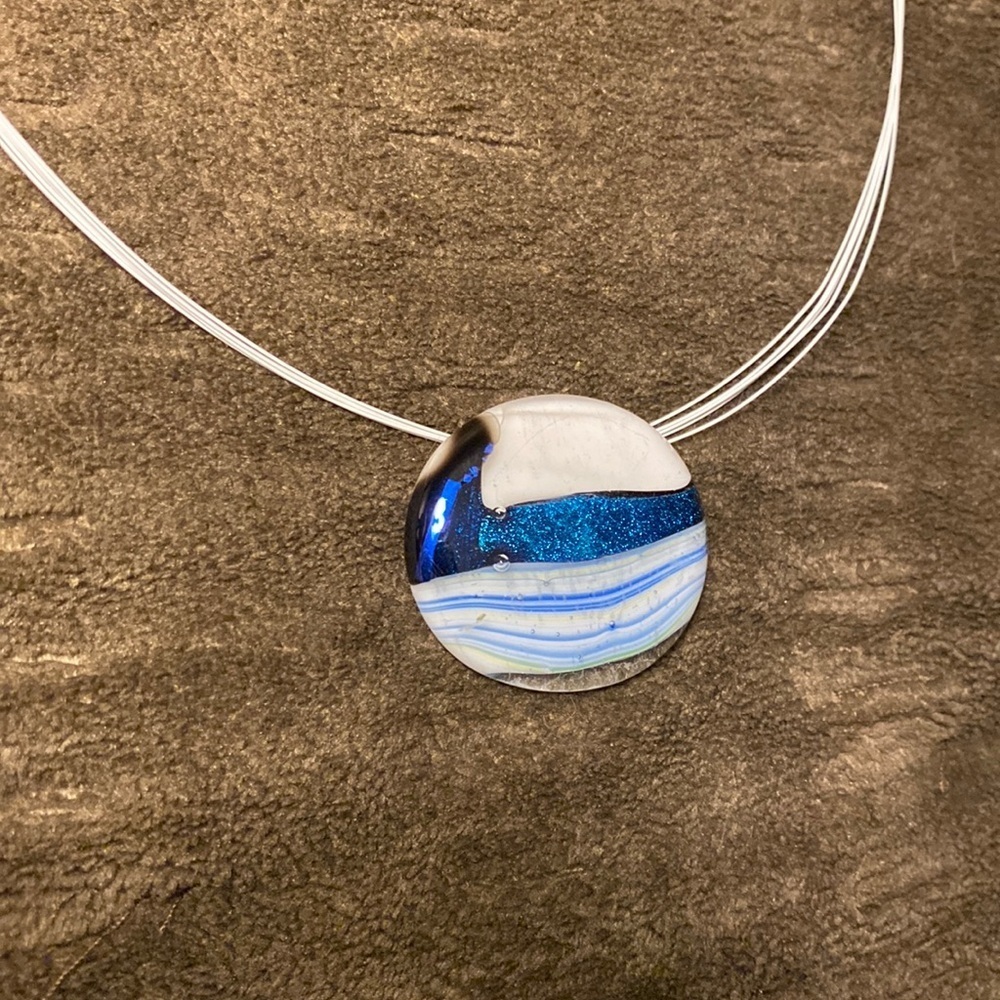 Locally crafted glass art. Glass on necklace.